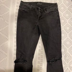 black ripped lucky jeans